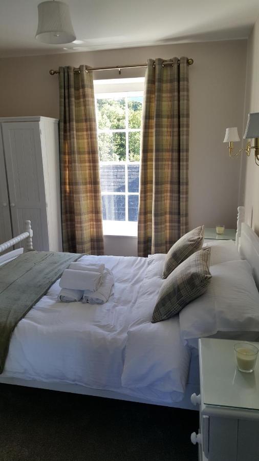 Central Bar Guesthouse Cushendall Exteriör bild