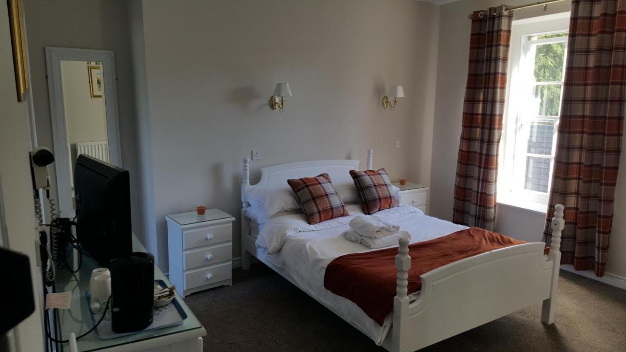 Central Bar Guesthouse Cushendall Exteriör bild